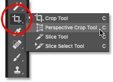 Choosing the Perspective Crop Tool from behind the standard Crop Tool in the Photoshop Toolbar.