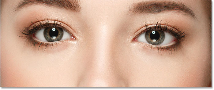 A close-up of the woman's eyes from the upscaled Smart Object.