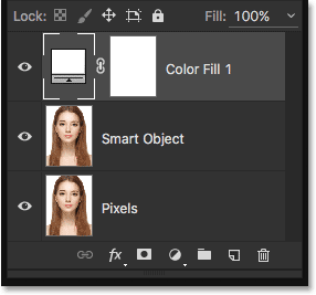 The Layers panel showing the Solid Color fill layer above the two image layers.