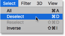 Choosing the Deselect command from under the Select menu. 