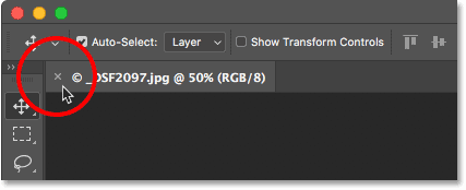 To close a Photoshop document, click the 'x' icon in the tab.