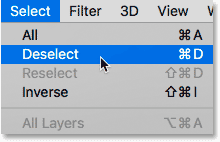 Choosing the Deselect command from under the Select menu in Photoshop.