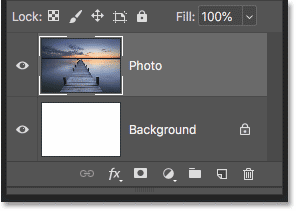 The Layers panel showing the image on its own layer above the Background layer.