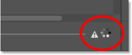 The progress icons in the lower right of the Content-Aware Fill's Preview panel in Photoshop