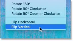 Choosing the Flip Vertical command from Free Transform in Photoshop