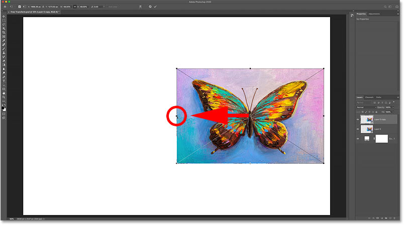 Moving the Free Transform Reference Point from the center to the side of the image.