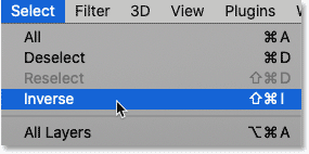 Choosing Inverse from the Select menu in Photoshop.