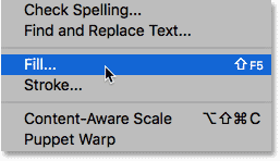 Choosing the Fill command from the Edit menu in Photoshop. 