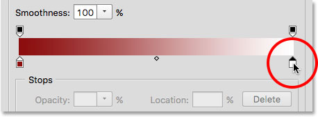 Double-clicking on the white color stop in the Gradient Editor. 