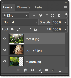 The Layers panel showing all three images on separate layers.