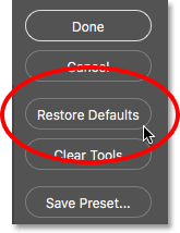 The Restore Defaults button in the Customize Toolbar dialog box.