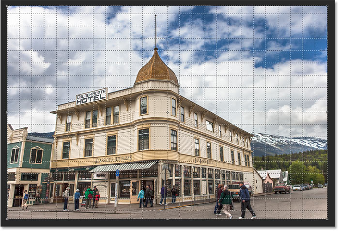 The Perspective Crop Tool adds a perspective grid to the image in Photoshop