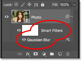 The Gaussian Blur smart filter listed below the smart object in the Layers panel