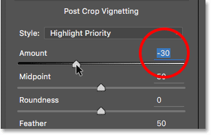 Adjusting the Post Crop Vignetting Amount slider in the Camera Raw Filter dialog box