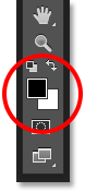 The Foreground and Background color swatches in the Tools panel. Image © 2016 Photoshop Essentials.com