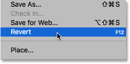 Selecting the Revert command from under the File menu. Image © 2016 Photoshop Essentials.com