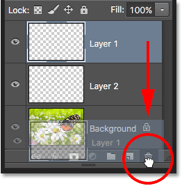 Dragging a layer down into the Trash Bin. Image © 2016 Photoshop Essentials.com