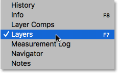 Selecting the Layers panel from the Window menu in Photoshop. 