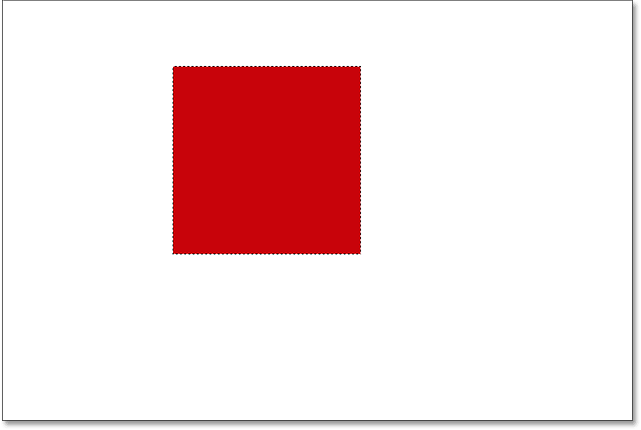 The selection has been filled with red. Image © 2016 Photoshop Essentials.com