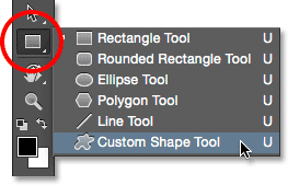 Selecting the Custom Shape Tool from the Tools panel. 