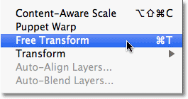 Selecting the Free Transform command in Photoshop. 