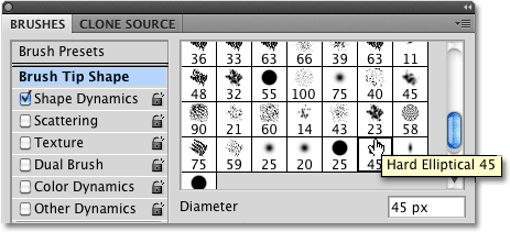 Choosing the Hard Elliptical 45 pixel brush from the Brushes panel in Photoshop. 