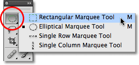 Selecting the Rectangular Marquee Tool in the Tools panel in Photoshop. 