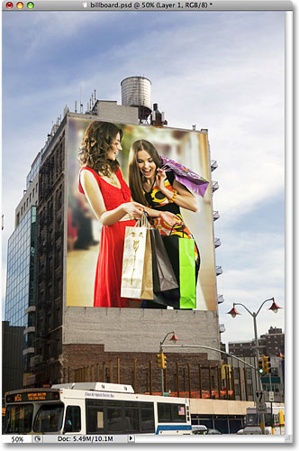 The photo of two women shopping now appears on the billboard. 