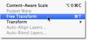 Selecting the Free Transform command in Photoshop. 