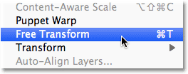 Selecting the Free Transform command in Photoshop. 