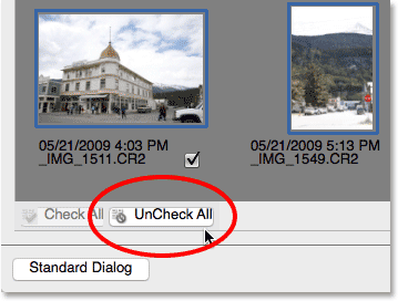 Clicking the UnCheck All button in the Photo Downloader.