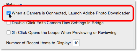 The When a Camera is Connected, Launch Adobe Photo Downloader option in the Bridge CC Preferences.