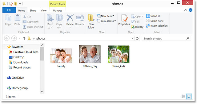 A folder in Windows 8 containing three JPEG files. Image © 2014 Photoshop Essentials.com