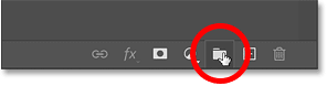 Clicking the Create New Group icon in Photoshop's Layers panel.