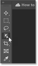 Selecting the Object Selection Tool from Photoshop's toolbar.