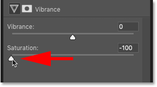 Lowering the Saturation value for the Vibrance adjustment layer