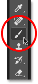 Selecting the Brush Tool from the Toolbar in Photoshop.
