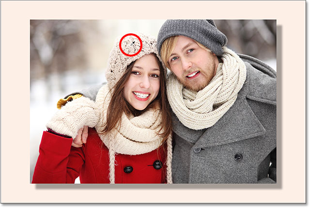 The color of the woman's hat is a better choice for the border. 