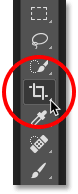 Selecting the Crop Tool from the Toolbar.