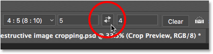 Clicking the arrows to change the orientation of the crop. 