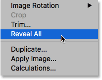 Choosing the Reveal All command from under the Image menu.
