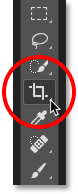 Selecting the Crop Tool from the Toolbar. Image © 2016 Photoshop Essentials.com