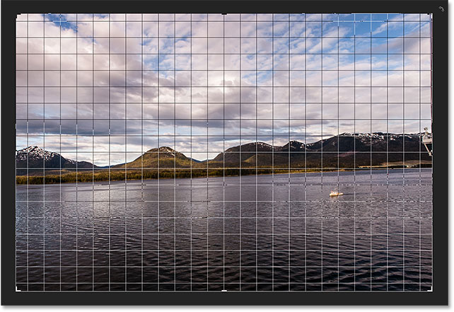 The 3 x 3 grid changes into a more detailed grid when you click and hold your mouse button. Image © 2016 Photoshop Essentials.com