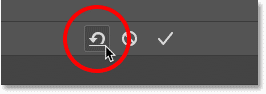 Clicking the Reset button for the Crop Tool in Photoshop