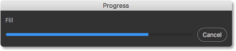 The Progress bar for Content-Aware Crop. Image © 2016 Steve Patterson, Photoshop Essentials.com