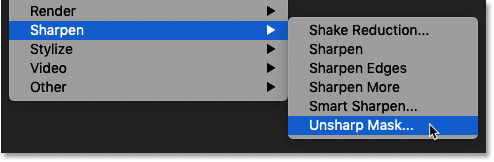 Selecting the Unsharp Mask filter from the Filter menu in Photoshop