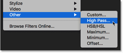 Selecting the High Pass filter from under the Filter menu in Photoshop