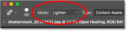 Changing the blend mode for the Spot Healing Brush to Lighten. 