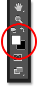 The Foreground and Background color swatches in the Tools panel. Image © 2016 Photoshop Essentials.com