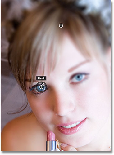 Lowering the blur amount with the second pin. Image © 2012 Photoshop Essentials.com